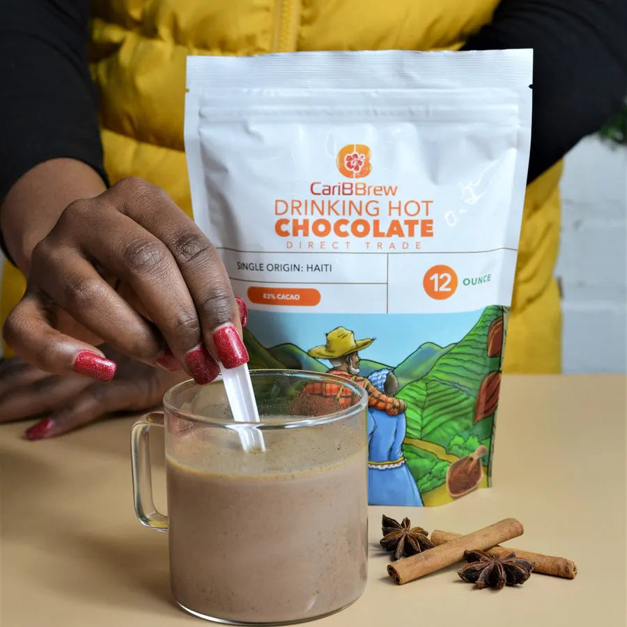 Stirring a glass of Haitian hot chocolate