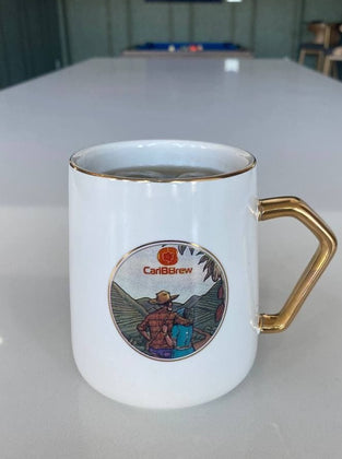White Caribbrew mug with Haitian arts - Caribbrew